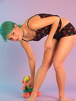 Fun girl with green hair shows off her world class ass.