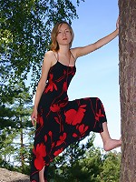 Sexpot teenager strips outside and finger fucks herself.