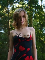 Sexpot teenager strips outside and finger fucks herself.