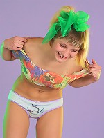 Limber teen babe in super cute panties does some gymnastics.