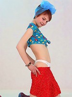 Crazy chick wears wild clothes and gets herself off.