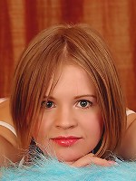 Laying on her bed desperate to get out of her cute panties