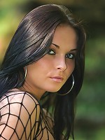 Stunning young brunnette gets naked in the outdoors