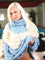 Gorgeous young blonde exposing her pussy in the water