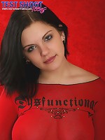 Sweet brunette teen shows off her big boobs in a red top