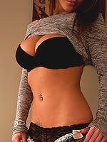 Nikki Sims shows off her sweater kittens