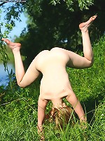 Leggy babe Linda poses and strips out of black lingerie