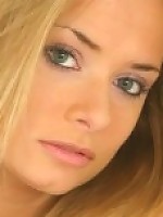 Curvaceous Rachel posing in cut off jeans topless