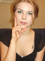 Beatrix undresses on her sofa