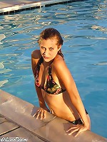 Allison getting wet in the pool