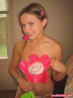 Lovable Kitty and her fake flower