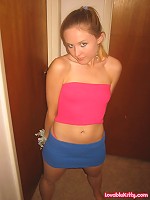 Kitty in her red tube top and mini skirt