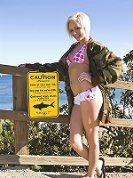 Miley enjoying the cool ocean breeze against her body.