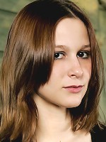 Beautiful brunette exposes her sexy body outdoors