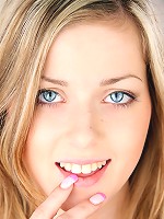 Babe with blue eyes petting pussy