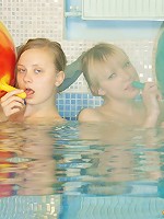 Teens swimming together in a pool