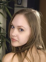 Cutie petting her vagina indoors