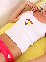 Good looking teenage babe playing