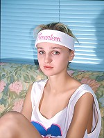 Inserting a dildo into tight muff