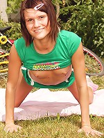 Horny teenager on a bike outdoors