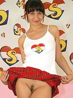 Brunette teenie girl toying pussy