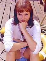 Teenage redhead girlie spreading