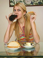 Skinny teen Stacey masturbates on the glass table