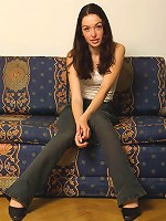 Teen beauty caresses her wet cunt