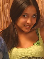 Kamilla pulling down her garments