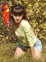 Russian teen Juliya strips in a field
