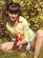 Russian teen Juliya strips in a field