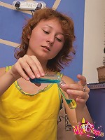 Hot teen Tiffany inserts a soap bubble toy into her wet pussy