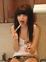 Kaira smears melting chocolate all over her petite naked body