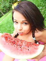 Barely legal teen Kiki touching herself in the garden