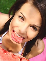 Sweet and naked teen laying on the ground outdoors