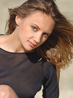 Zemani.com Ziza - Young cute girl in the black top poses on the stairs outdoor.